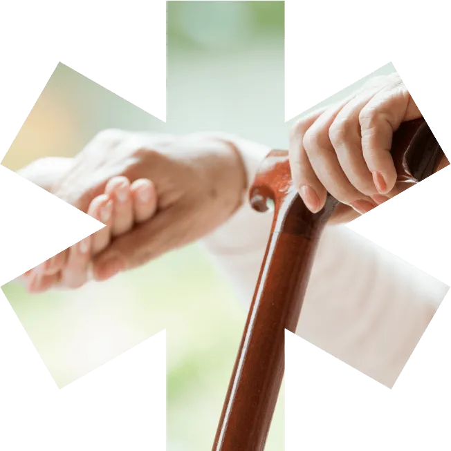 Hände – eine hält einen Gehstock, die anderen hält die Hand einer anderen person